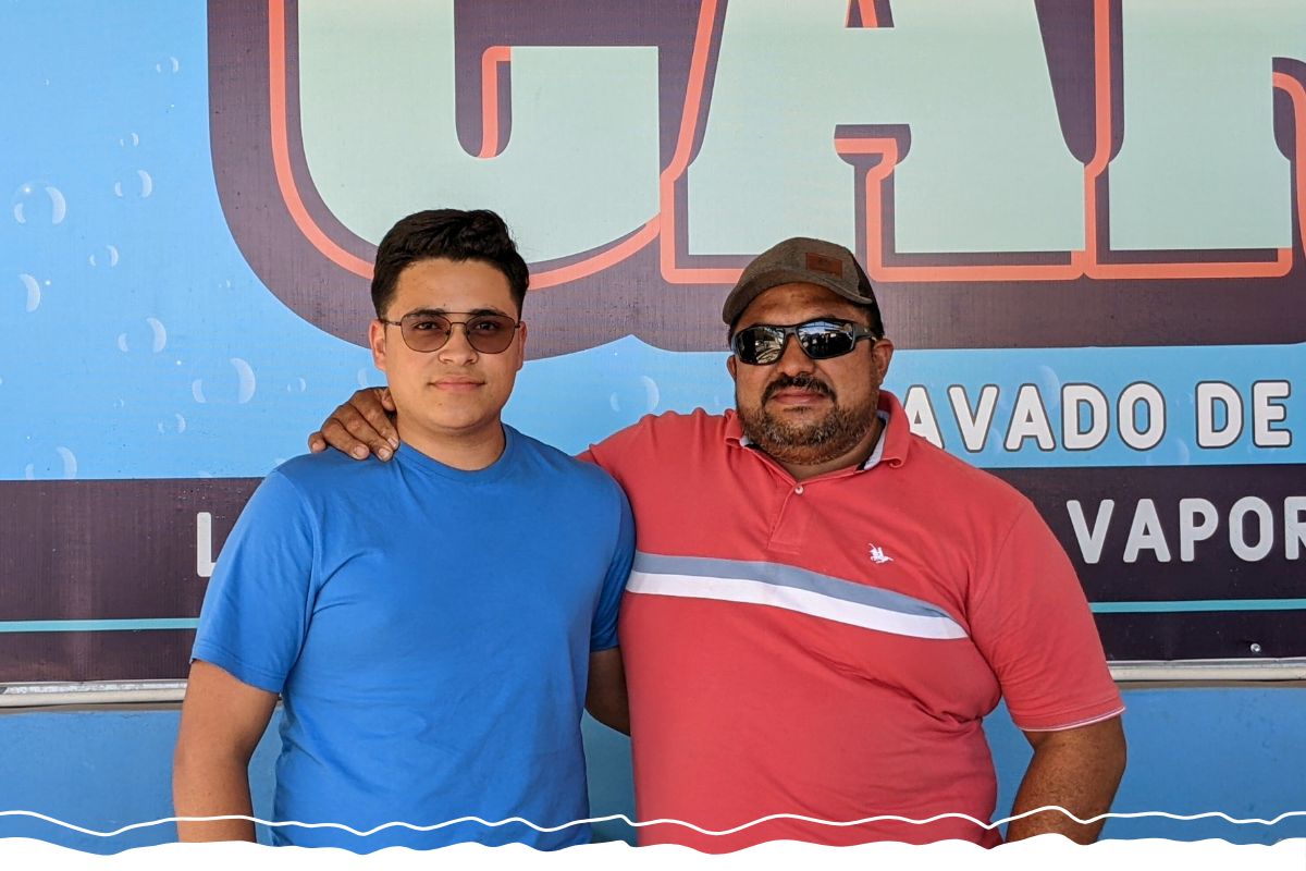 Nimrod (right) built a thriving construction business and auto plaza. Now his son wants to follow in his steps.